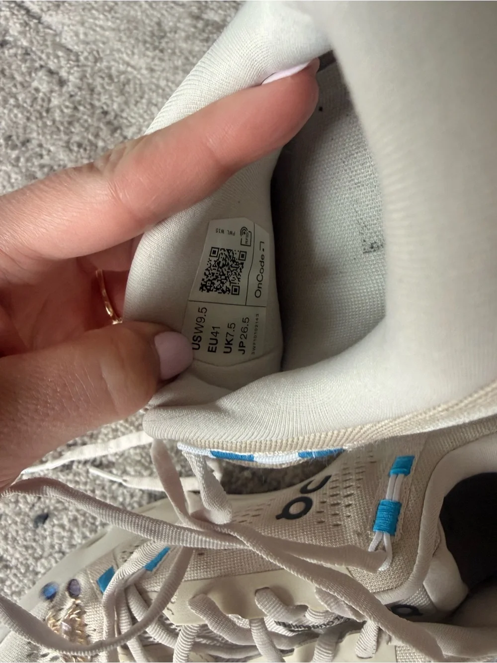 On Running Women's CloudSurfer Sand Beige Athletic Shoes with Blue Accents